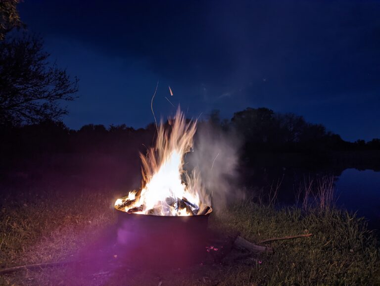 Fire at the communal fire ring at the pond